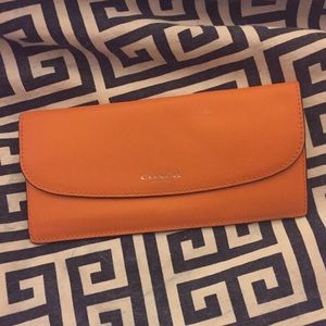 orange COACH soft wallet